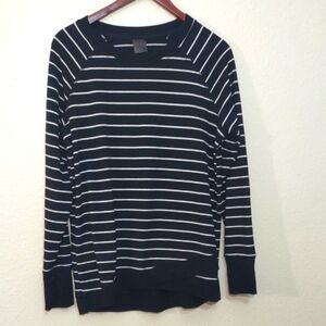 USED DANSKIN SIZE L LONG SLEEVE HORIZONTAL STRIPED SHIRT HAS PAINT ON BOTTOM